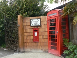 Doors on Phone box and post box at entrance to Lost garden of Heligan
